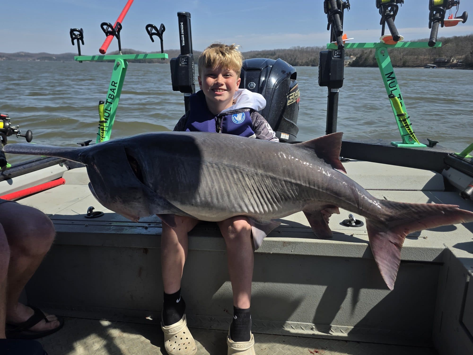 Young angler with a nice catfish