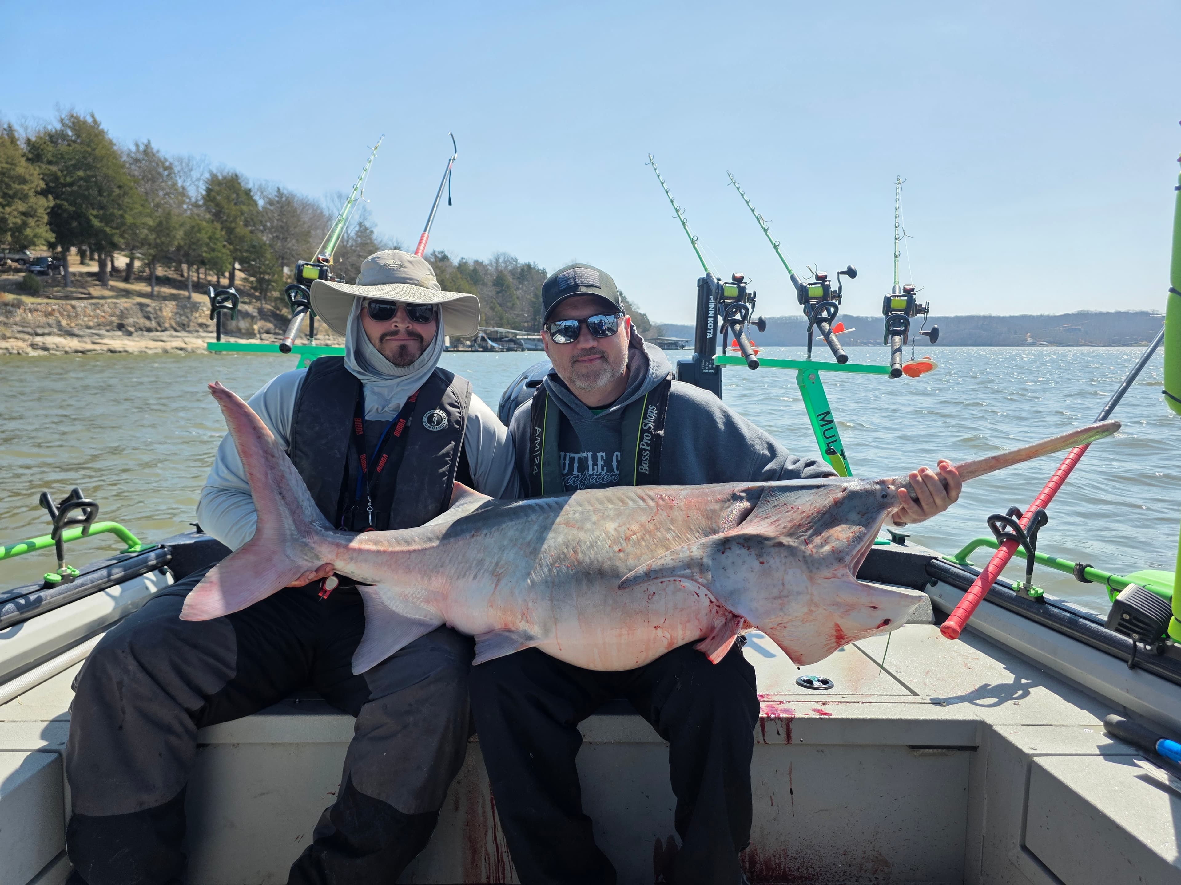 Two guides with a trophy spoonbill